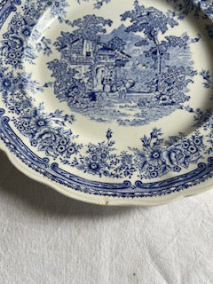 Lot de 6 assiettes plates anciennes Lunéville K&G – décor champêtre bleu XIXe (26 cm) + 1 avec petit éclat